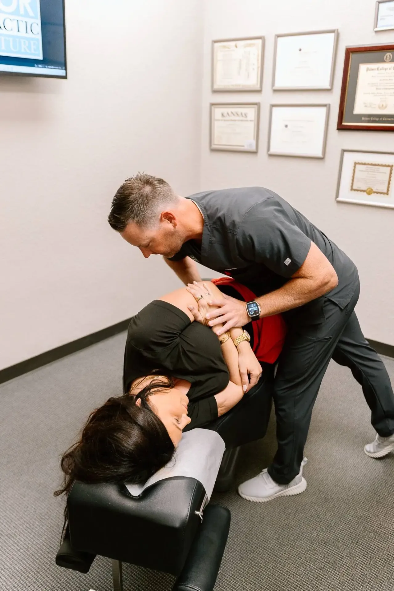 Dr. Meylor performing chiropractic treatment for disc injury